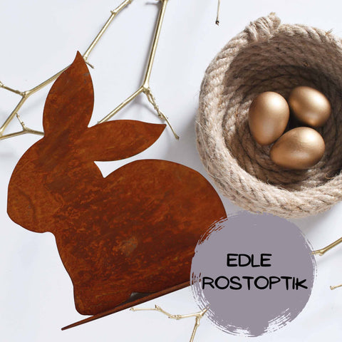 Osterhase als Wohndeko: Handgefertigte Metallfigur in sitzender Pose als süße Hasendeko.