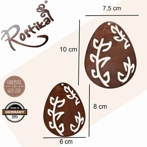 Dekoratives Rostikal-Osterei aus Metall mit rankenverziertem Design